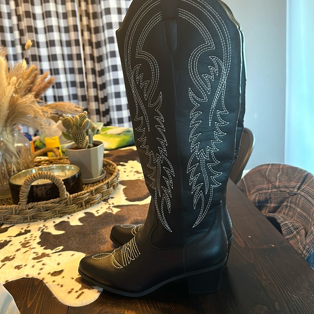 Women’s black cowboy boots- come up to under the knee